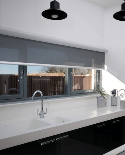 grey-roller-blinds-on-kitchen-windows
