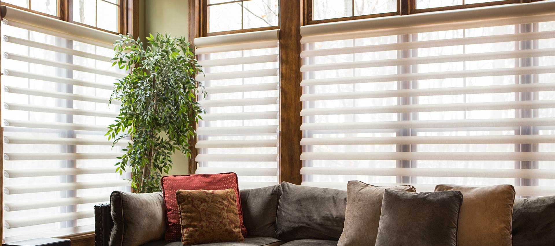 zebra-blinds-before-couch-and-artwork