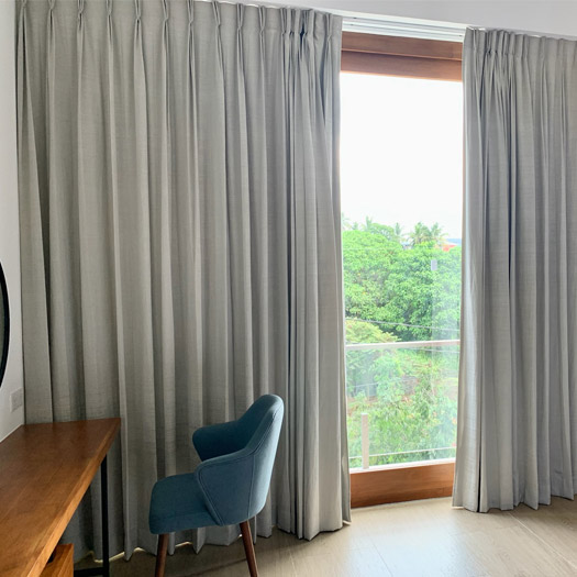 grey-blackout-curtains-in-bedroom
